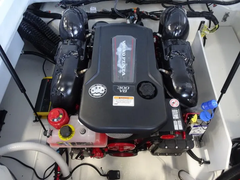 Slide: The Image of 2025 Cobalt R4 engine compartment featuring a Volvo Penta 300 V8 engine. - 26