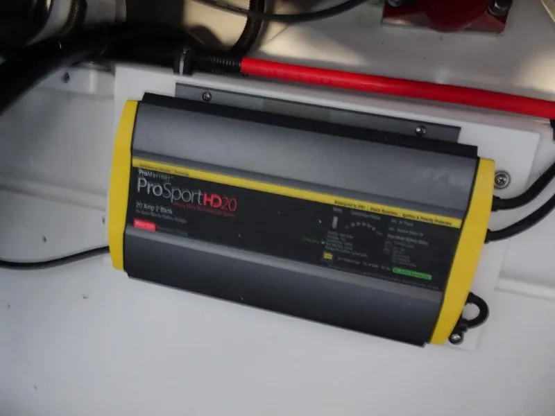 Slide: The Image of Onboard battery charger in a 2025 Cobalt R4 boat. - 27