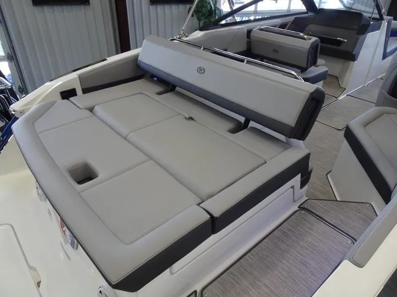 Slide: The Image of 2025 Cobalt R4 boat interior with spacious seating and modern design. - 9