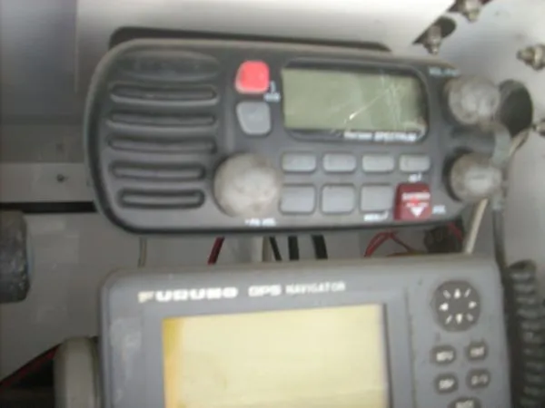 Slide: The Image of A radio and GPS navigator are installed on a boat. - 32