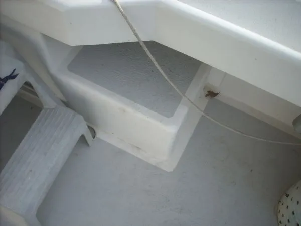 Slide: The Image of Close-up of a white boat deck with steps and a rope. - 18