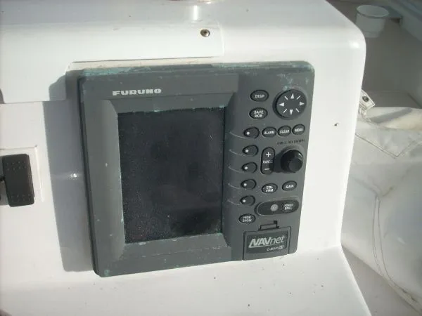 Slide: The Image of A Furuno NAVnet screen is mounted on a boat, surrounded by controls and buttons. - 24