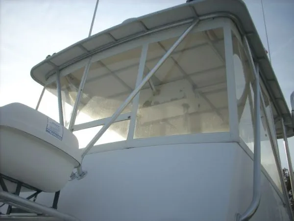 Slide: The Image of A 2000 Duffy Flybridge Sportfisherman with an enclosed flybridge and antennas. - 44