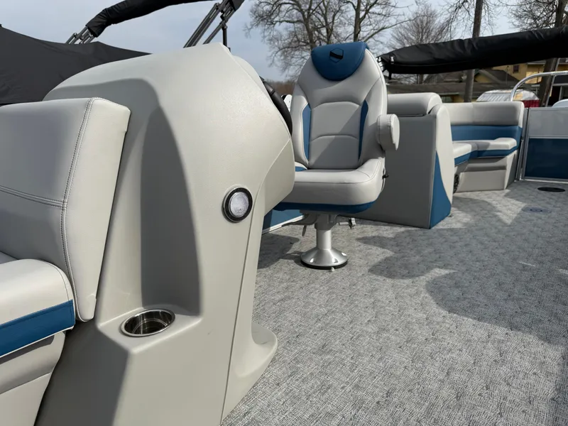 Slide: The Image of 2025 South Bay 224RS LE boat interior with modern seating and sleek design. - 12