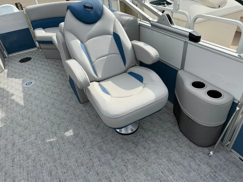 Slide: The Image of Luxurious seating on 2025 South Bay 224RS LE boat with cup holders and plush upholstery. - 13