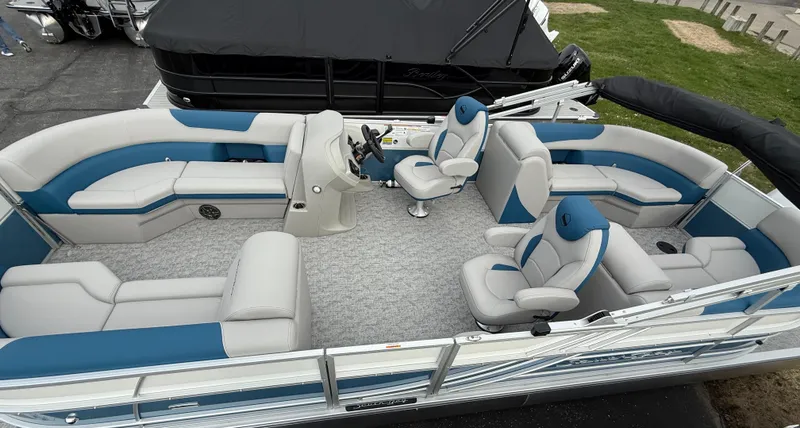 Slide: The Image of 2025 South Bay 224RS LE pontoon boat with spacious seating and modern design. - 8