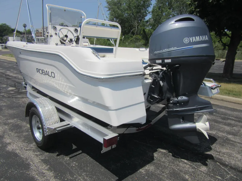 Slide: The Image of 2025 Robalo R160 Center Console boat with Yamaha engine on trailer. - 11