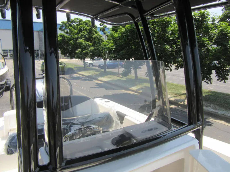 Slide: The Image of 2025 Robalo R202 Explorer boat with sleek windshield and sturdy frame. - 16