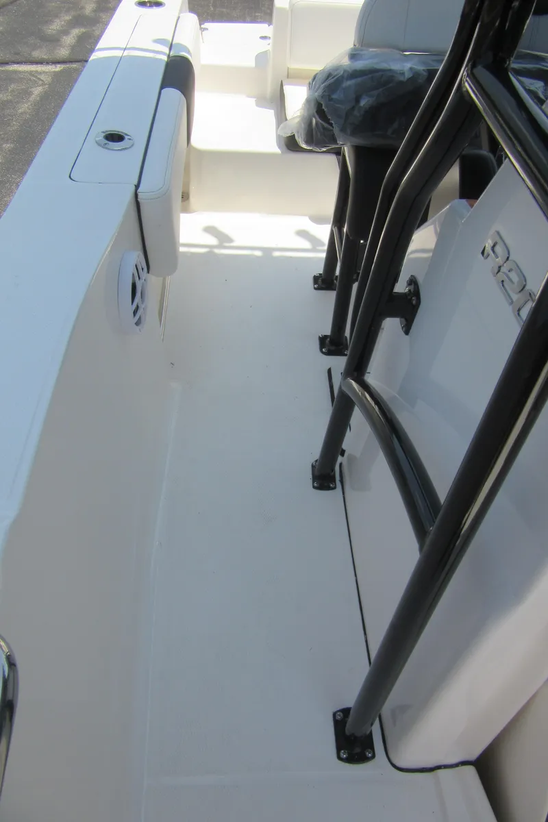 Slide: The Image of 2025 Robalo R202 Explorer boat interior with sleek design and sturdy railing. - 28