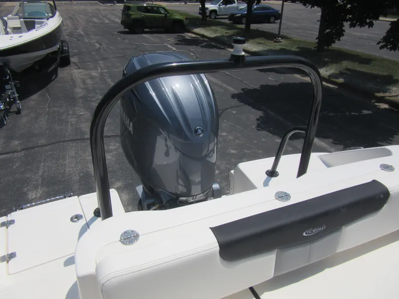 Slide: The Image of 2025 Robalo R202 Explorer boat with Yamaha outboard motor, rear view. - 8