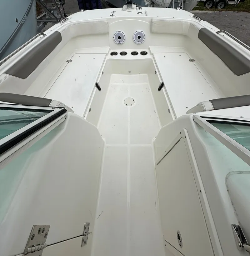Slide: The Image of 2021 World Cat 230 DC boat interior, featuring spacious seating and modern design. - 4