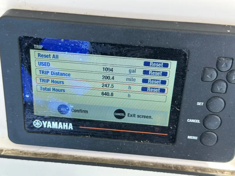 Slide: The Image of Yamaha display showing trip data for 2017 Scout 251 XS boat: fuel, distance, and hours. - 2