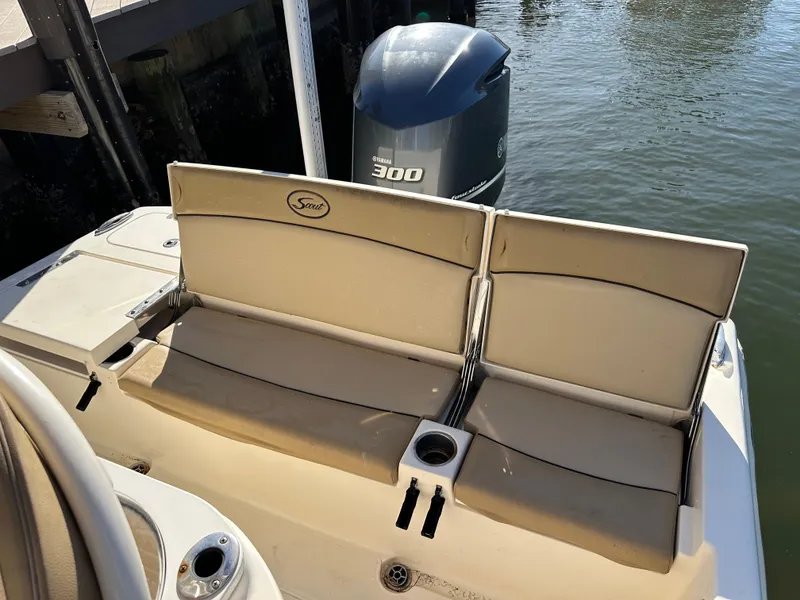 Slide: The Image of 2017 Scout 251 XS boat with Yamaha 300 engine, featuring beige seating. - 3