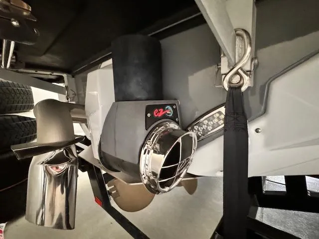 Slide: The Image of 2021 Nautique Super Air Nautique GS24 boat propeller and exhaust detail. - 15