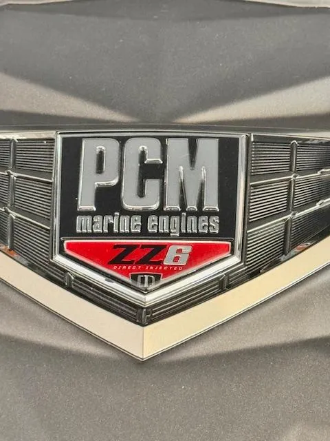 Slide: The Image of PCM marine engines logo on 2021 Nautique Super Air Nautique GS24. - 37