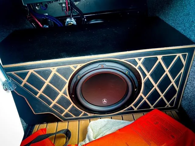 Slide: The Image of Subwoofer in 2021 Nautique Super Air Nautique GS24 boat, featuring a stylish geometric design. - 39