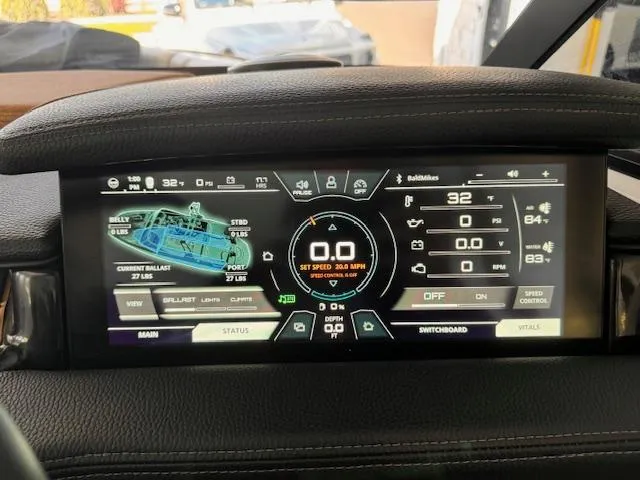 Slide: The Image of Dashboard of 2021 Nautique Super Air Nautique GS24 boat, displaying speed and ballast settings. - 40