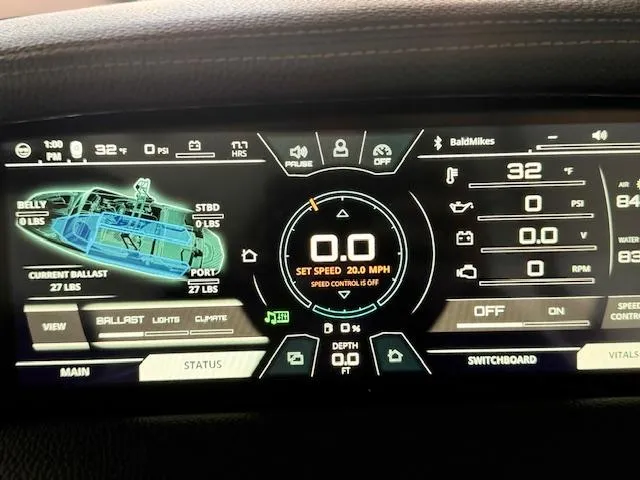 Slide: The Image of Dashboard of 2021 Nautique Super Air Nautique GS24 boat, displaying speed and ballast settings. - 41