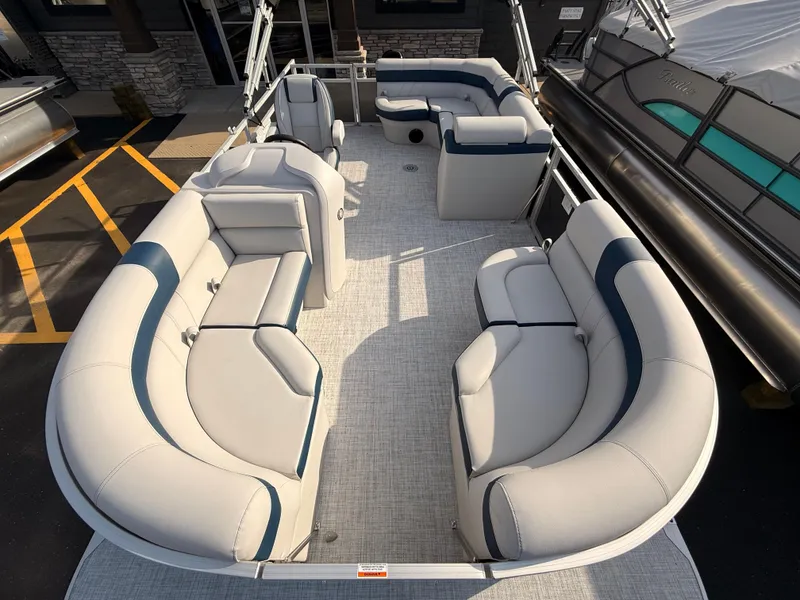 Slide: The Image of 2025 South Bay 20CR SE S pontoon boat with spacious seating and modern design. - 5