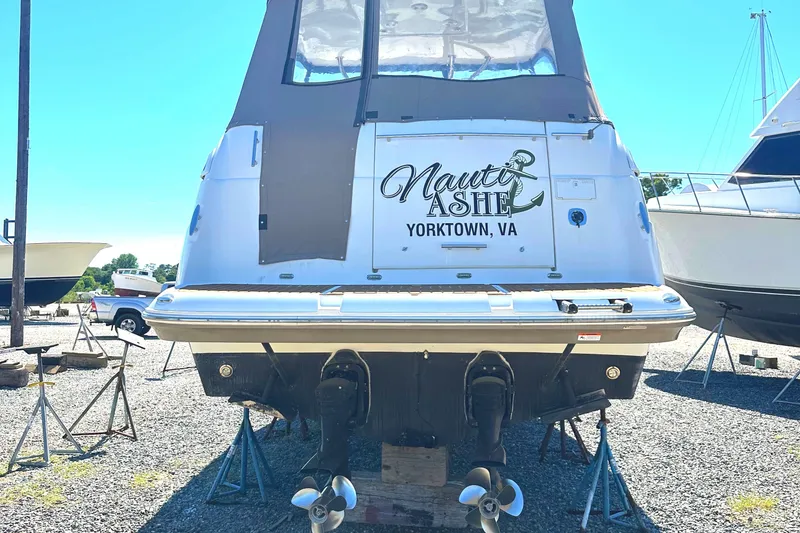 Slide: The Image of 2006 Larson Cabrio 350 boat on stands, Yorktown, VA, rear view. - 10