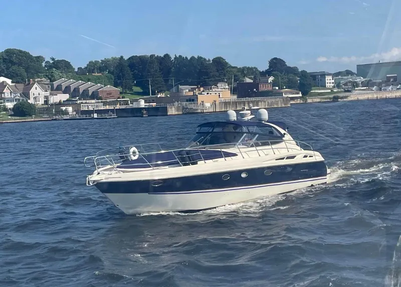 Slide: The Image of 2003 Cranchi 50 Mediterranne yacht cruising on a scenic river. - 3