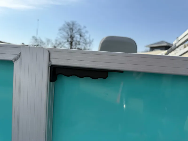 Slide: The Image of 2025 South Bay S222CR2 boat detail with aluminum frame and turquoise panel. - 18