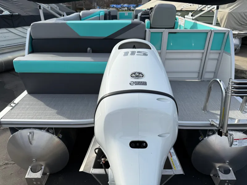 Slide: The Image of 2025 South Bay S222CR2 pontoon boat with Yamaha 115 engine, teal and gray seating. - 28