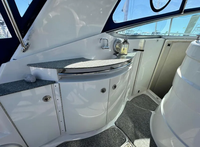 Slide: The Image of 2005 Chaparral Signature 350 yacht interior with sleek cabinetry and modern design. - 4