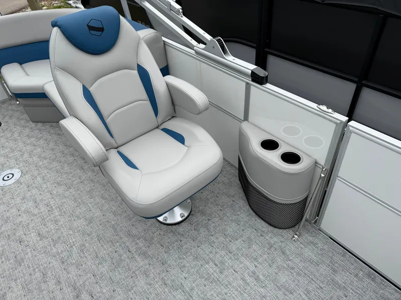 Slide: The Image of Luxurious seating on 2025 South Bay 220RS LE pontoon boat with cup holders. - 3