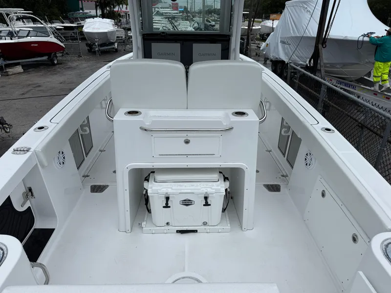 Slide: The Image of 2025 Wellcraft 263 Fisherman boat interior with seating and storage. - 5