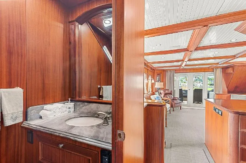 Slide: The Image of Luxurious interior of 2006 Paragon Cockpit Motoryacht with wood finishes and elegant design. - 10