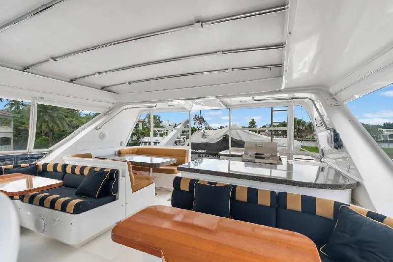 Slide: The Image of Luxurious 2006 Paragon Cockpit Motoryacht interior with elegant seating and dining area. - 22