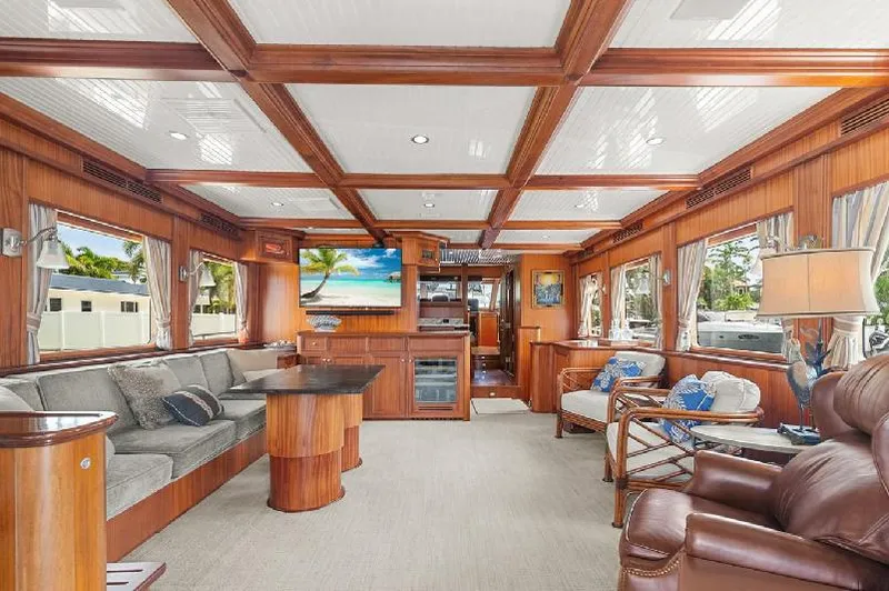Slide: The Image of Luxurious interior of 2006 Paragon Cockpit Motoryacht with elegant wood finishes and comfortable seating. - 3