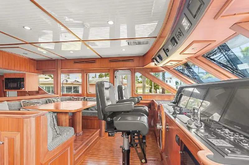 Slide: The Image of Luxurious 2006 Paragon Cockpit Motoryacht interior with plush seating and modern controls. - 7