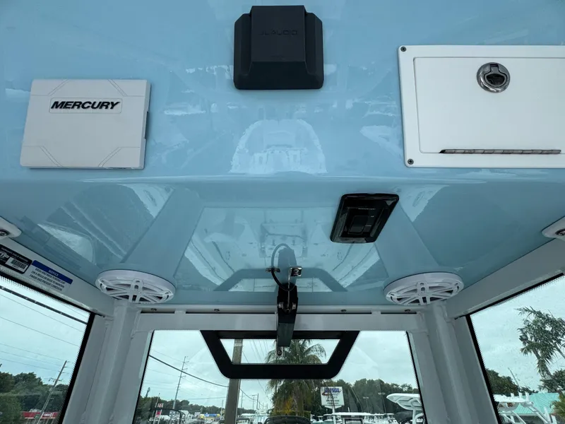 Slide: The Image of Interior view of 2025 Wellcraft 263 Fisherman boat, featuring Mercury equipment and modern design. - 10