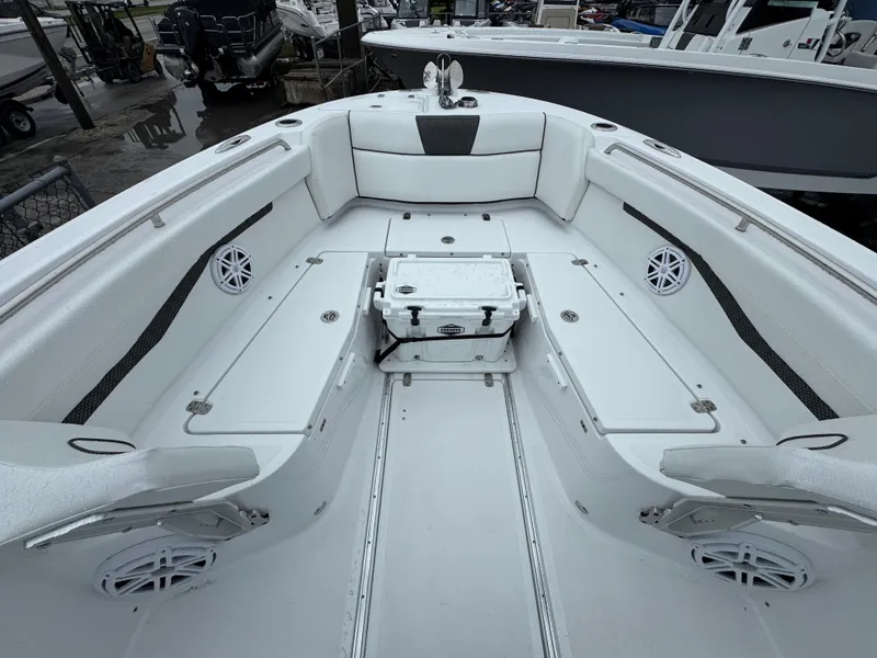 Slide: The Image of 2025 Wellcraft 263 Fisherman boat interior with spacious seating and storage. - 16