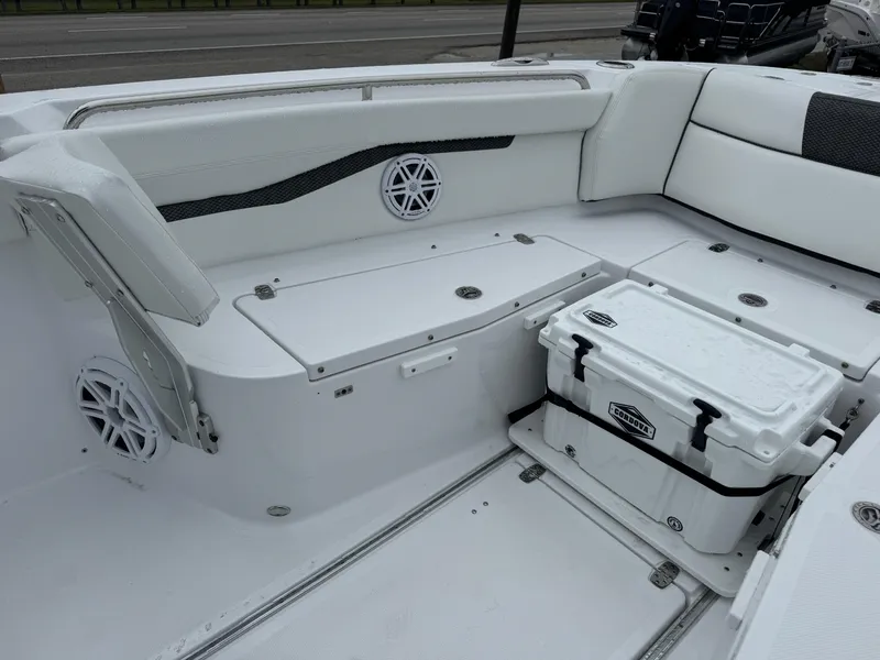 Slide: The Image of 2025 Wellcraft 263 Fisherman boat interior with seating and storage compartments. - 18