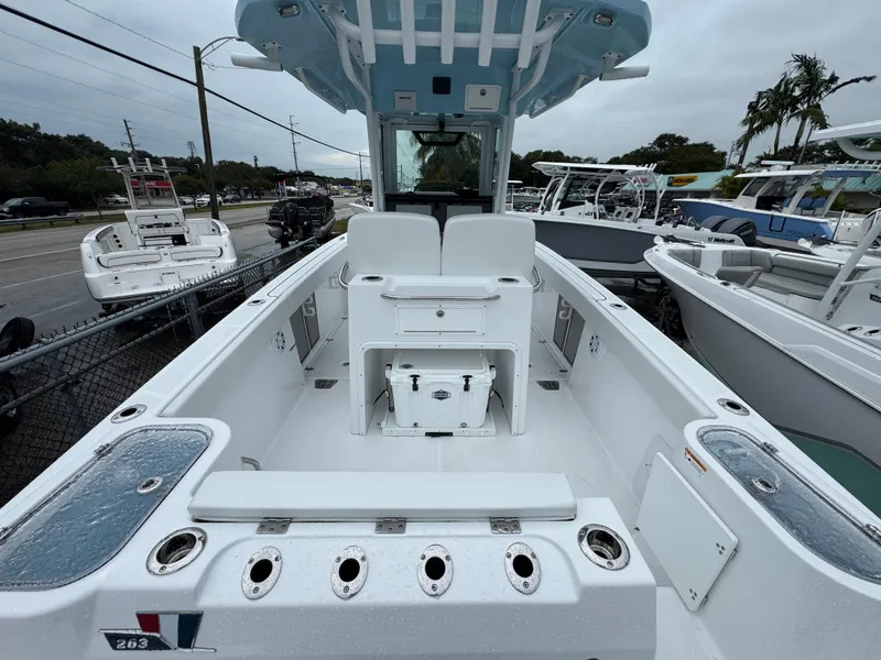 Slide: The Image of 2025 Wellcraft 263 Fisherman boat interior, featuring spacious deck and seating. - 4