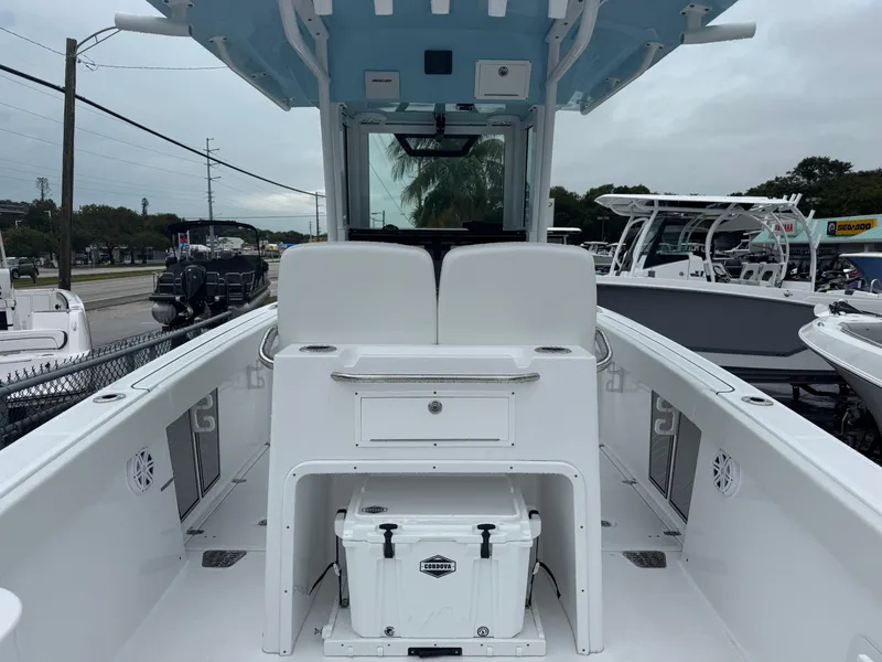 Slide: The Image of 2025 Wellcraft 263 Fisherman boat interior with seating and storage compartments. - 6