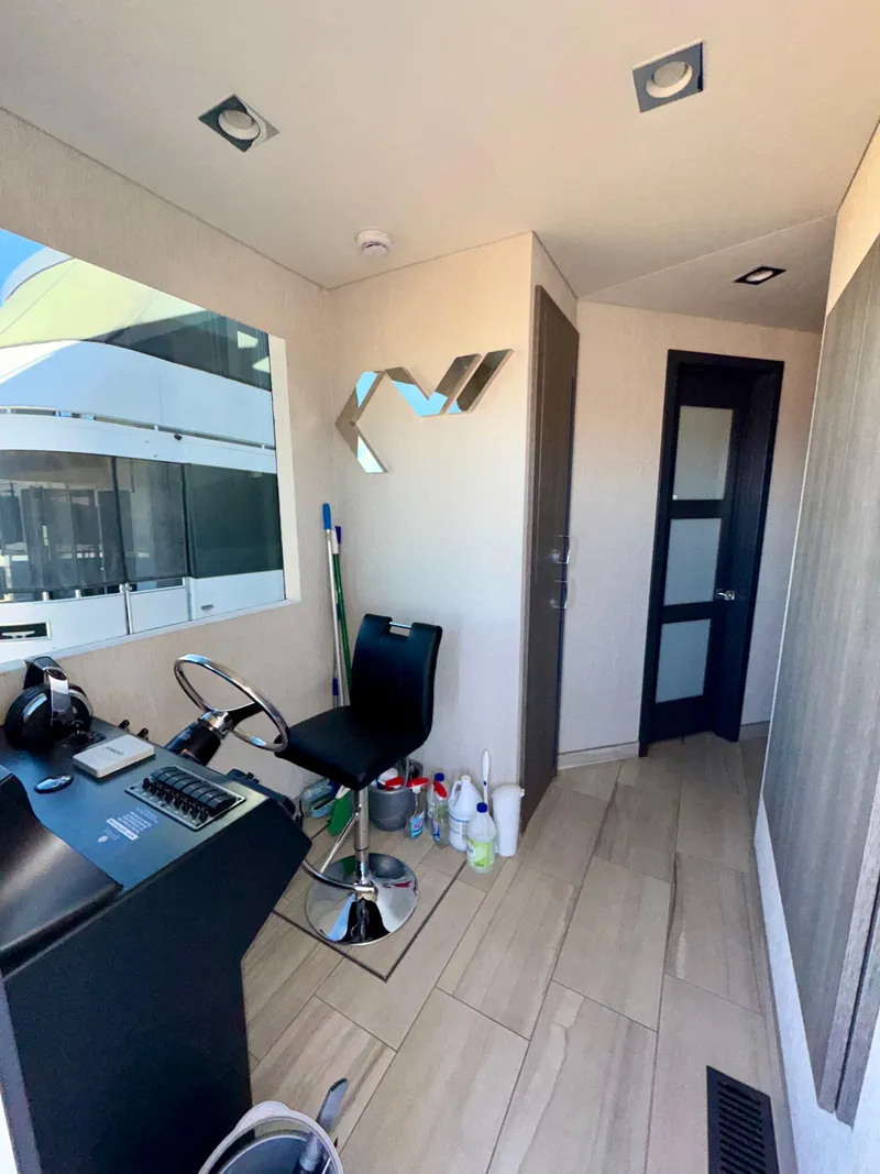 Slide: The Image of Modern interior of 2017 Adonia KSIX with office setup and sleek design. - 12