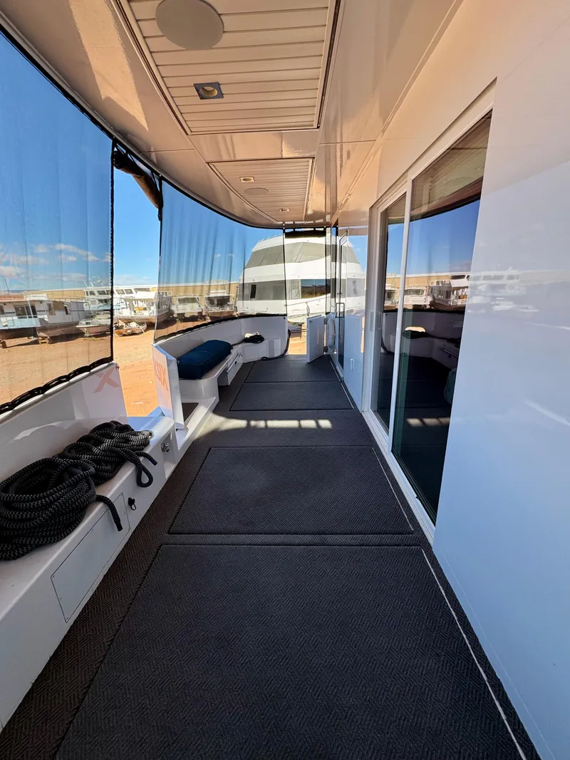 Slide: The Image of 2017 Adonia KSIX yacht deck with modern design and panoramic windows. - 17