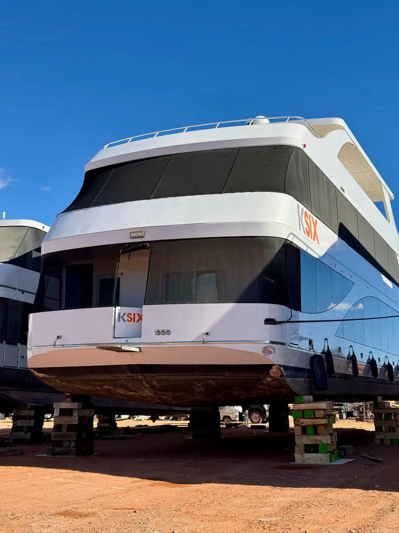 Slide: The Image of 2017 Adonia KSIX yacht on blocks, clear sky background. - 34