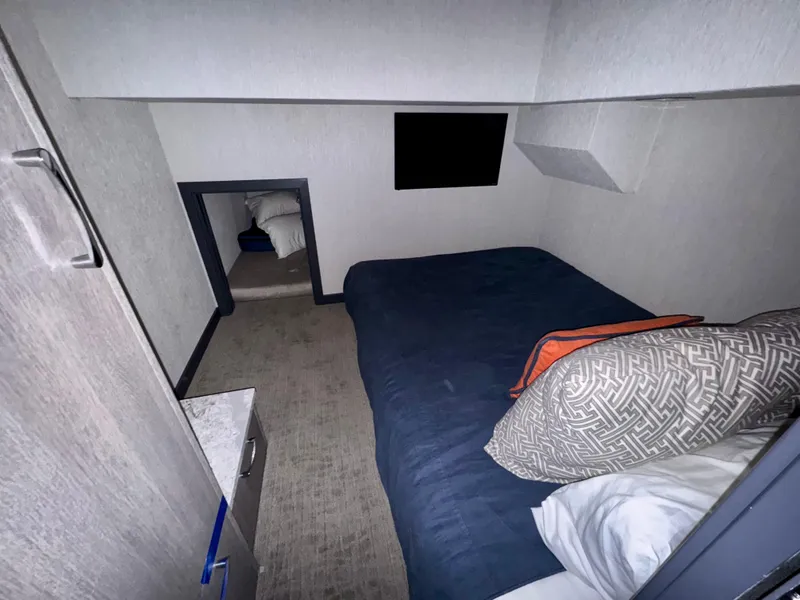 Slide: The Image of Compact bedroom interior of 2017 Adonia KSIX with bed and storage. - 8