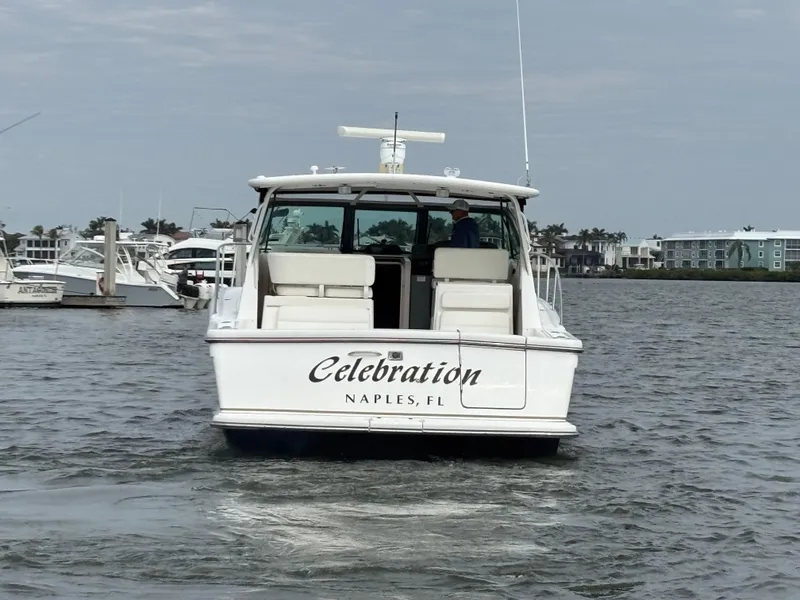 Slide: The Image of 2005 Tiara Yachts 3800 Open boat named "Celebration" in Naples, FL waters. - 4