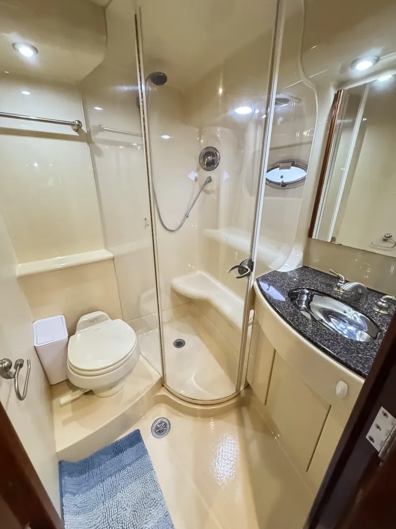 Slide: The Image of Luxurious bathroom in a 2006 Meridian 411 Sedan yacht with shower and modern amenities. - 17