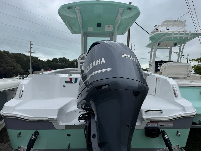Slide: The Image of 2025 Wellcraft 223 Fisherman boat with Yamaha 250 engine, rear view. - 3