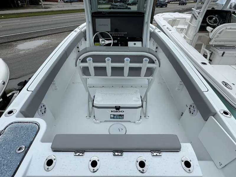 Slide: The Image of 2025 Wellcraft 223 Fisherman boat interior with seating and storage compartments. - 5