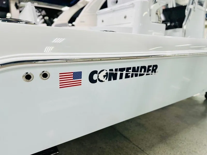 Slide: The Image of 2025 Contender 29BAY boat with American flag logo on the side. - 16