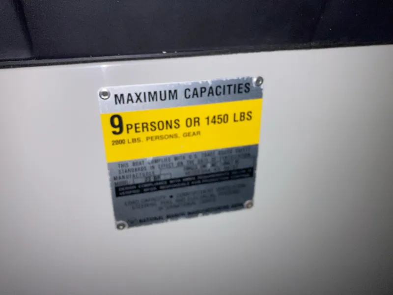 Slide: The Image of Capacity label on 1988 Cobalt 23 boat: 9 persons or 1450 lbs. - 10