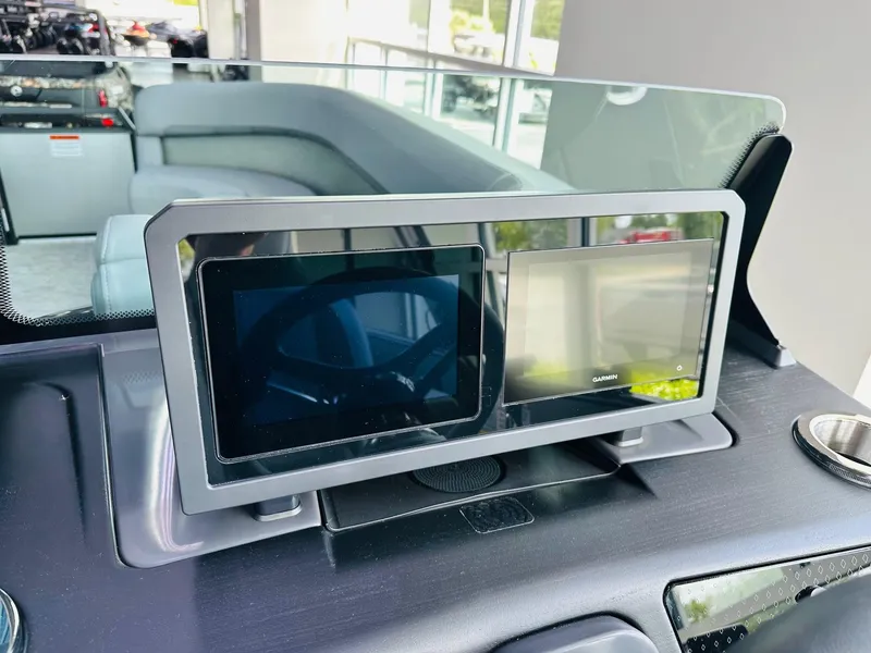 Slide: The Image of Dashboard of 2025 Bennington 24 MSB boat with dual display screens. - 3